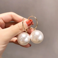 Stylish oversized pearl earrings for an elegant look