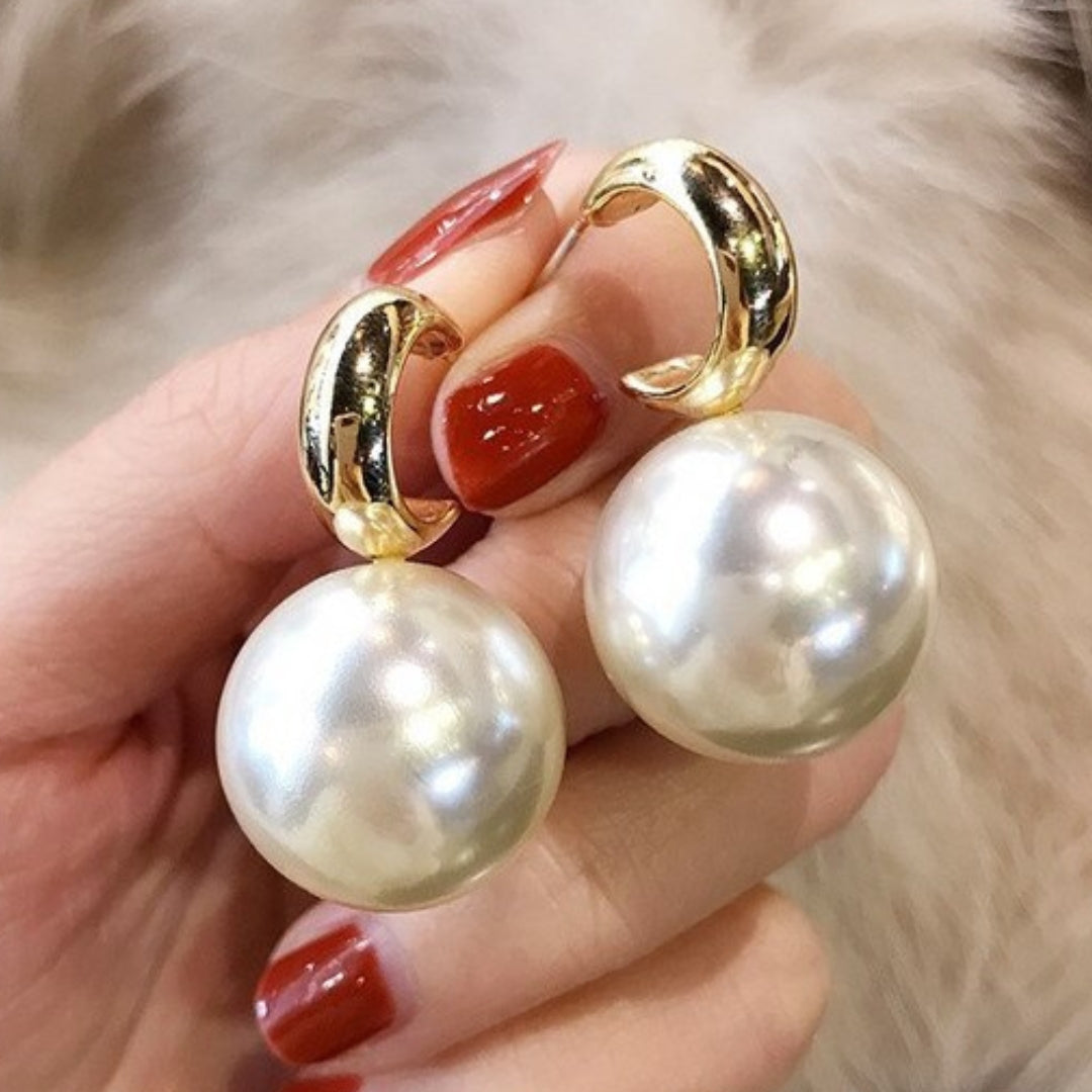 Elegant large gold pearl earrings