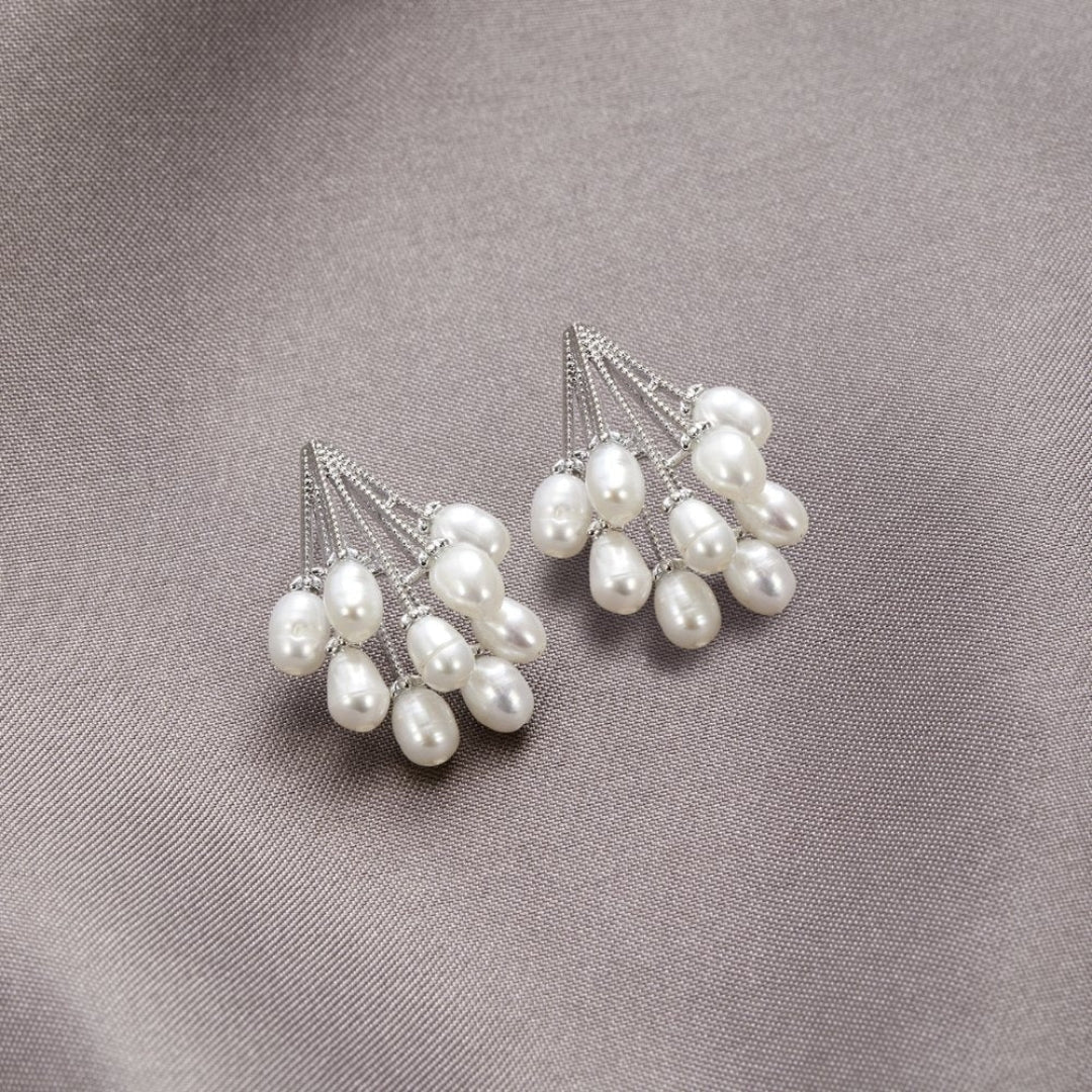 Elegant coral earrings decorated with exquisite freshwater pearls