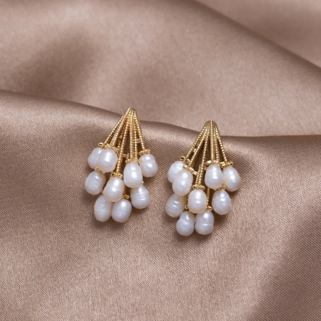 Elegant coral earrings decorated with exquisite freshwater pearls
