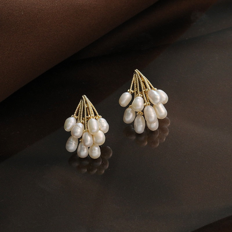 Elegant coral earrings decorated with exquisite freshwater pearls