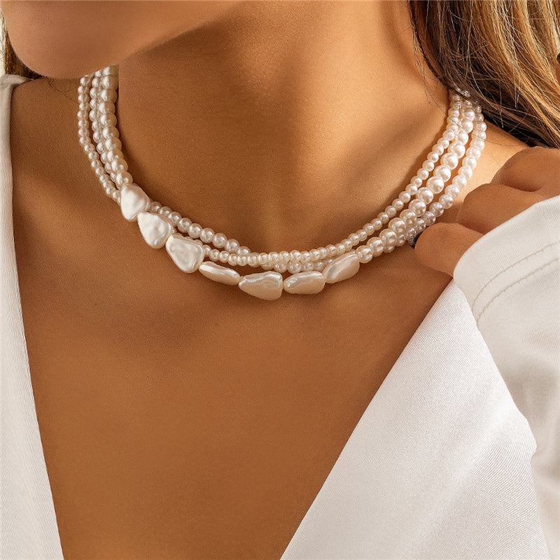Elegant Gold Necklace with White Stones and Dreamy Pearls