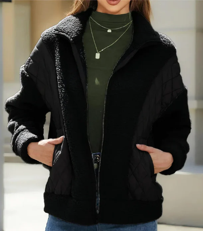 Stylish women's sherpa jacket with zipper and elegant quilted details