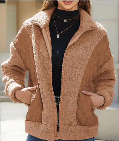 Stylish women's sherpa jacket with zipper and elegant quilted details