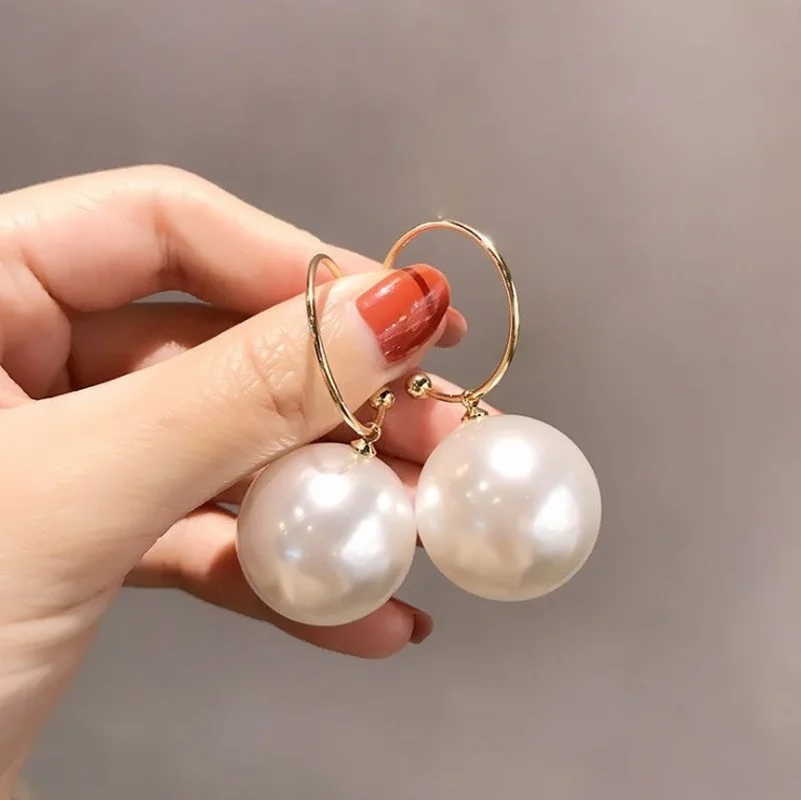 Stylish oversized pearl earrings for an elegant look